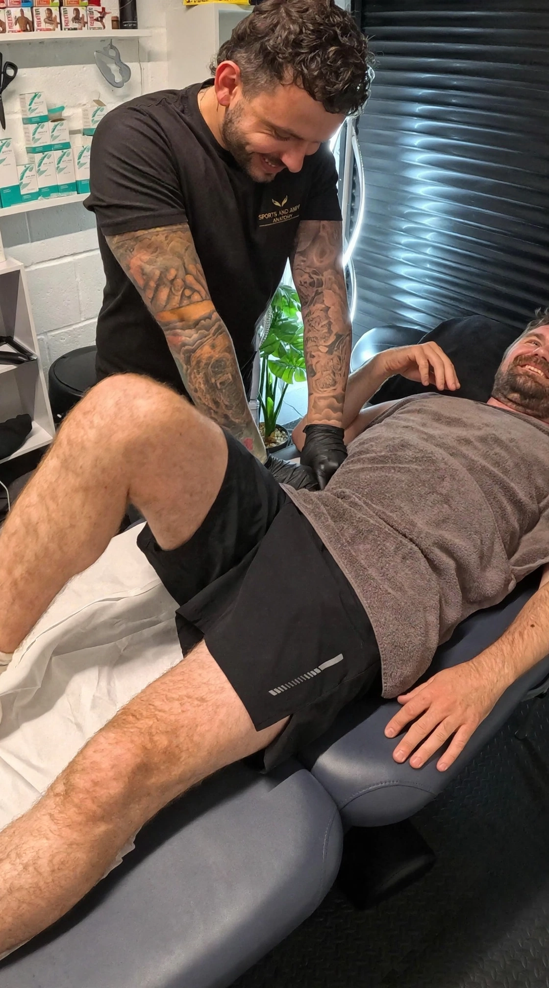 Ben Winchester smiling as he works with a client